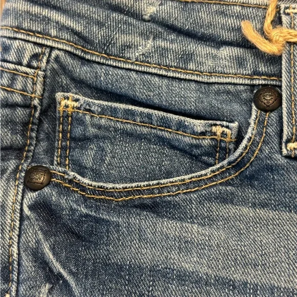 PAIGE Distressed Medium Blue Denim Shorts - Picture 6 of 8